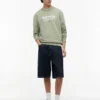 Tommy Jeans ロゴ スエード調スウェットシャツ Tommy Jeans ロゴ スエード調スウェットシャツ