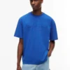 Tommy Jeans ディストレスド・ロゴTシャツ Tommy Jeans ディストレスド・ロゴTシャツ