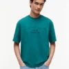 Tommy Jeans ディストレスド・ロゴTシャツ Tommy Jeans ディストレスド・ロゴTシャツ