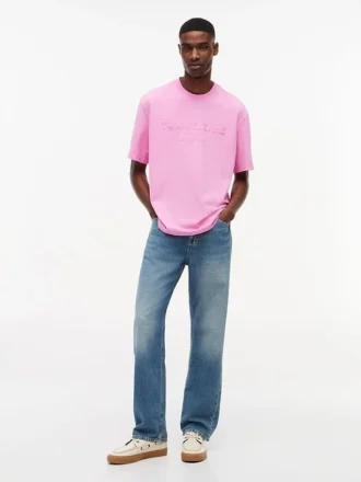 Tommy Jeans ディストレスド・ロゴTシャツ