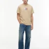 Tommy Jeans マルチクレスト ロゴ Tシャツ