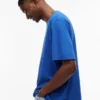 Tommy Jeans ディストレスド・ロゴTシャツ Tommy Jeans ディストレスド・ロゴTシャツ