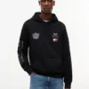 Tommy x Cadillac F1® Team グラフィック フーディー