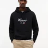 Tommy x Cadillac F1® Team マイアミ フーディー Tommy x Cadillac F1® Team マイアミ フーディー