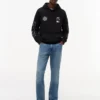 Tommy x Cadillac F1® Team グラフィック フーディー