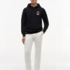 Tommy x Cadillac F1® Team ロゴ フーディー