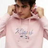 Tommy x Cadillac F1® Team マイアミ フーディー Tommy x Cadillac F1® Team マイアミ フーディー
