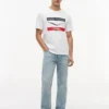 Tommy x Cadillac F1® Team シェブロン Tシャツ Tommy x Cadillac F1® Team シェブロン Tシャツ